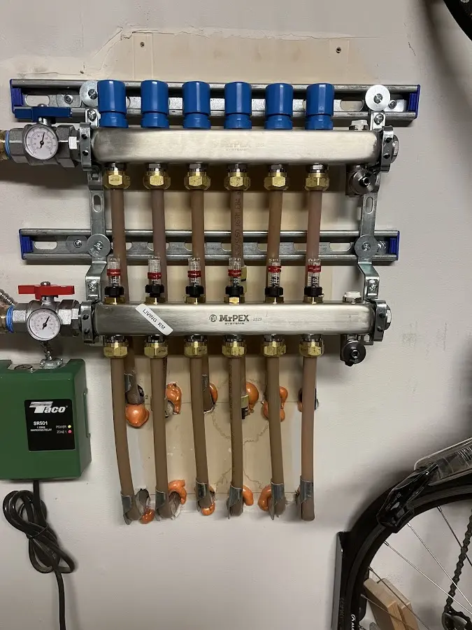 Plumber performing Gas Leak Detection at a residential property in Stoughton